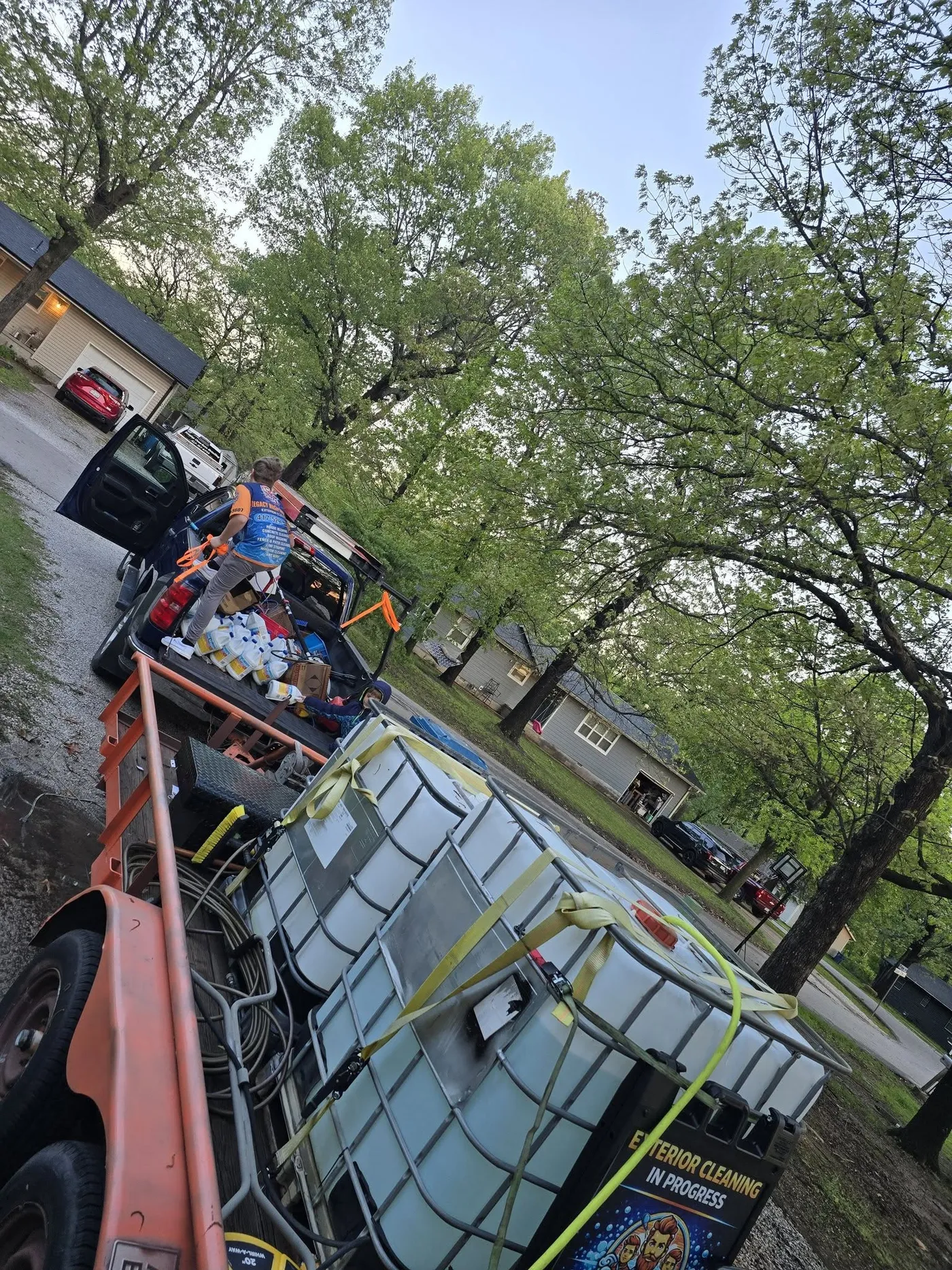 The crew loading the Legacy Wash Pros truck and water trailer