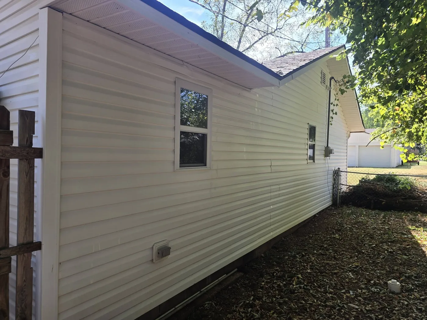 Bright, clean white vinyl siding after washing