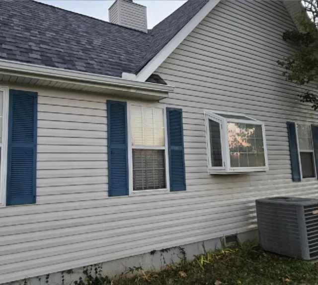 The same siding clean after a soft wash